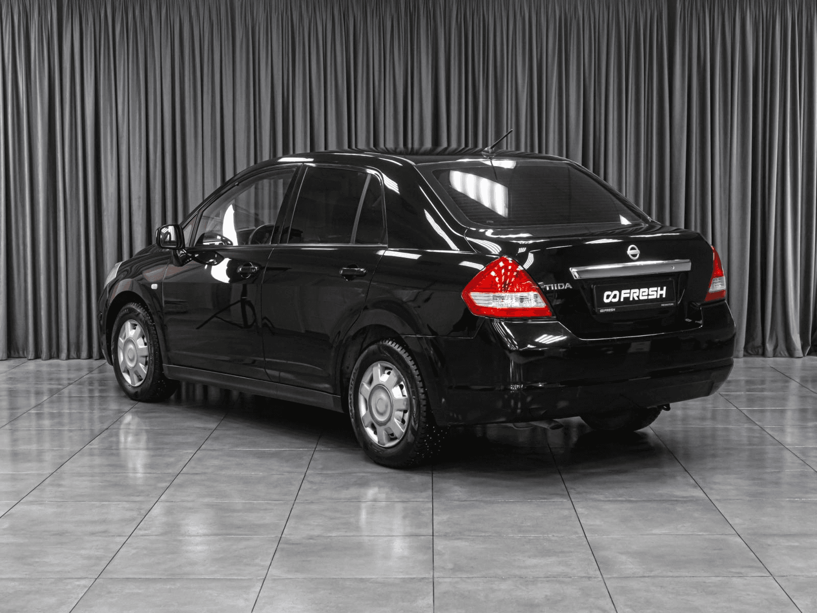 Nissan Tiida 2008 — миниатюра 2